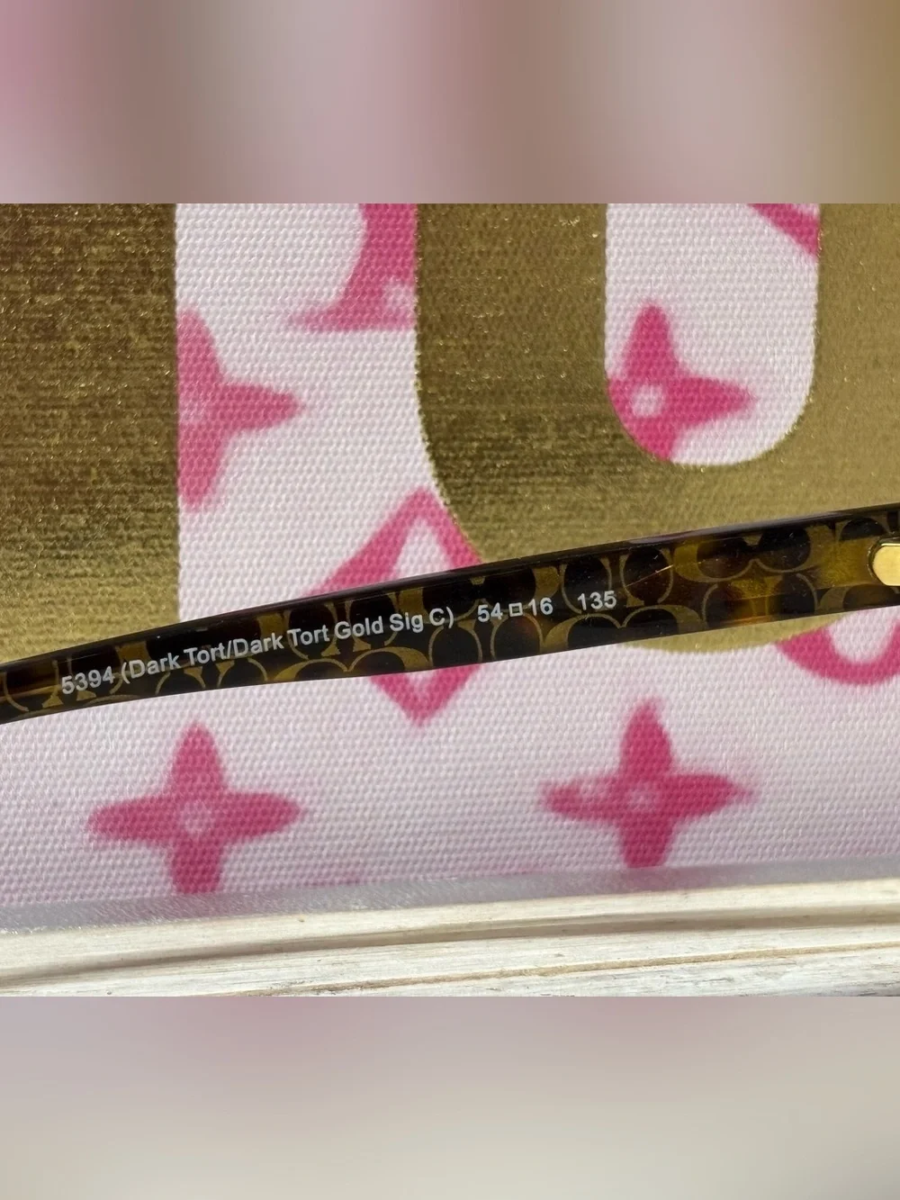 Coach Women's Tortoiseshell Frame Glasses with Signature Pattern